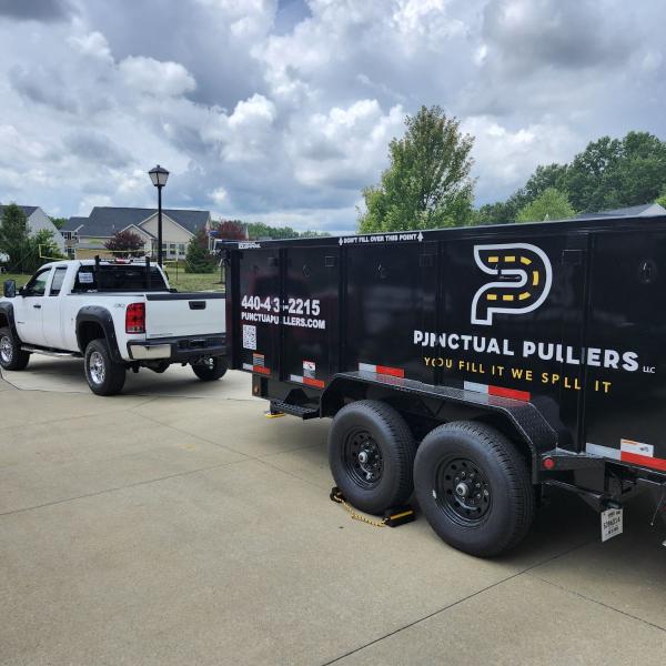 dumpster trailer in customers driveway