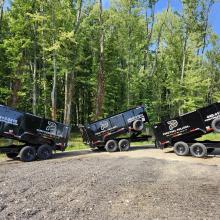 dumpster trailer with dump bed up